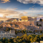 The Acropolis of Athens, Greece, with the Parthenon Temple on top of the hill during a summer sunset